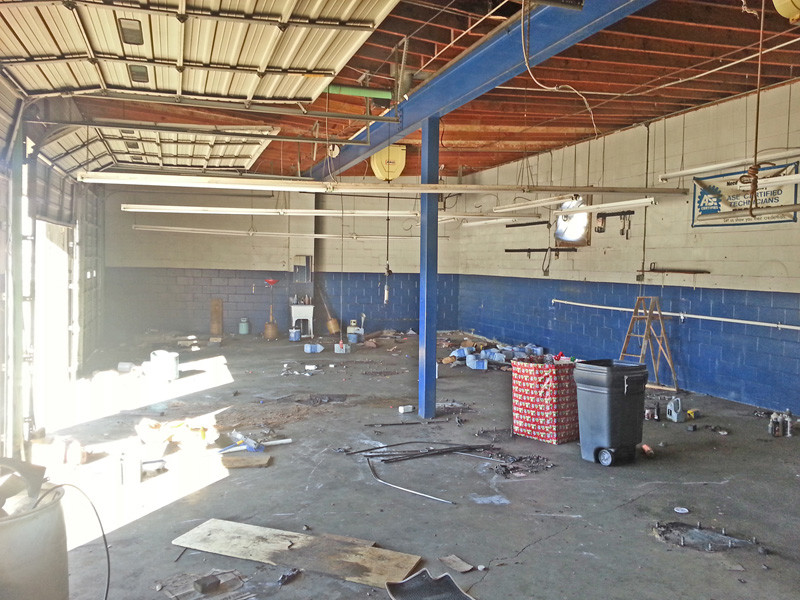 Anthem diesel repair shop concrete floor before Heavy Tonnage epoxy coating