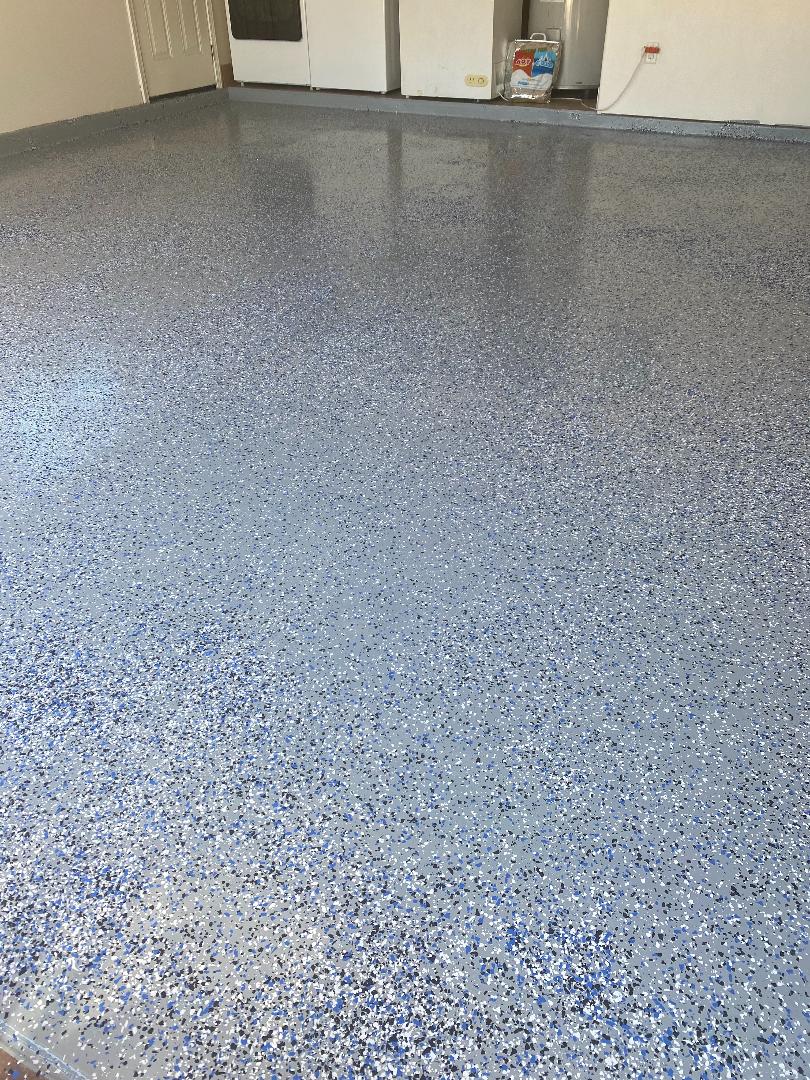 Finished Armor Chip garage epoxy floor with color flakes and Military Grade Topcoat
