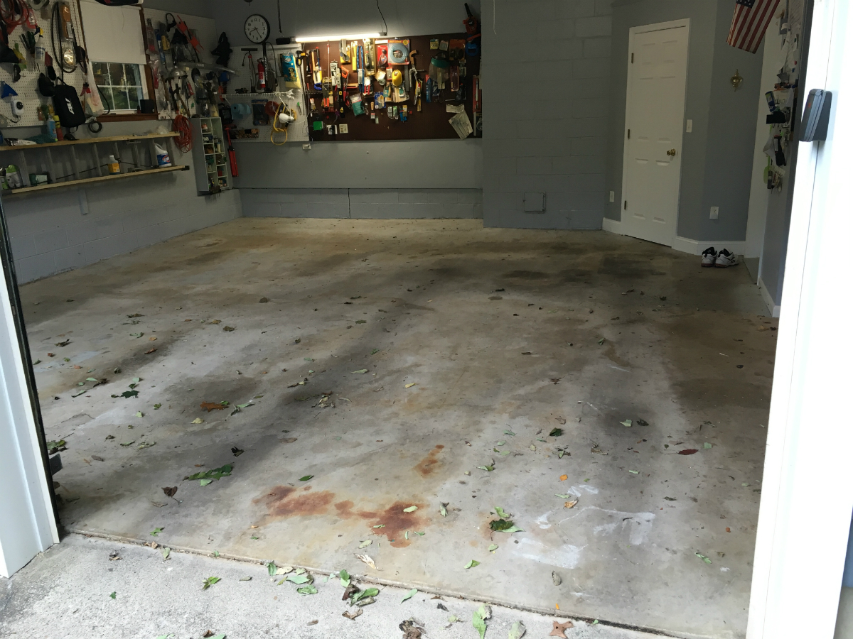 Bare garage concrete slab before coating