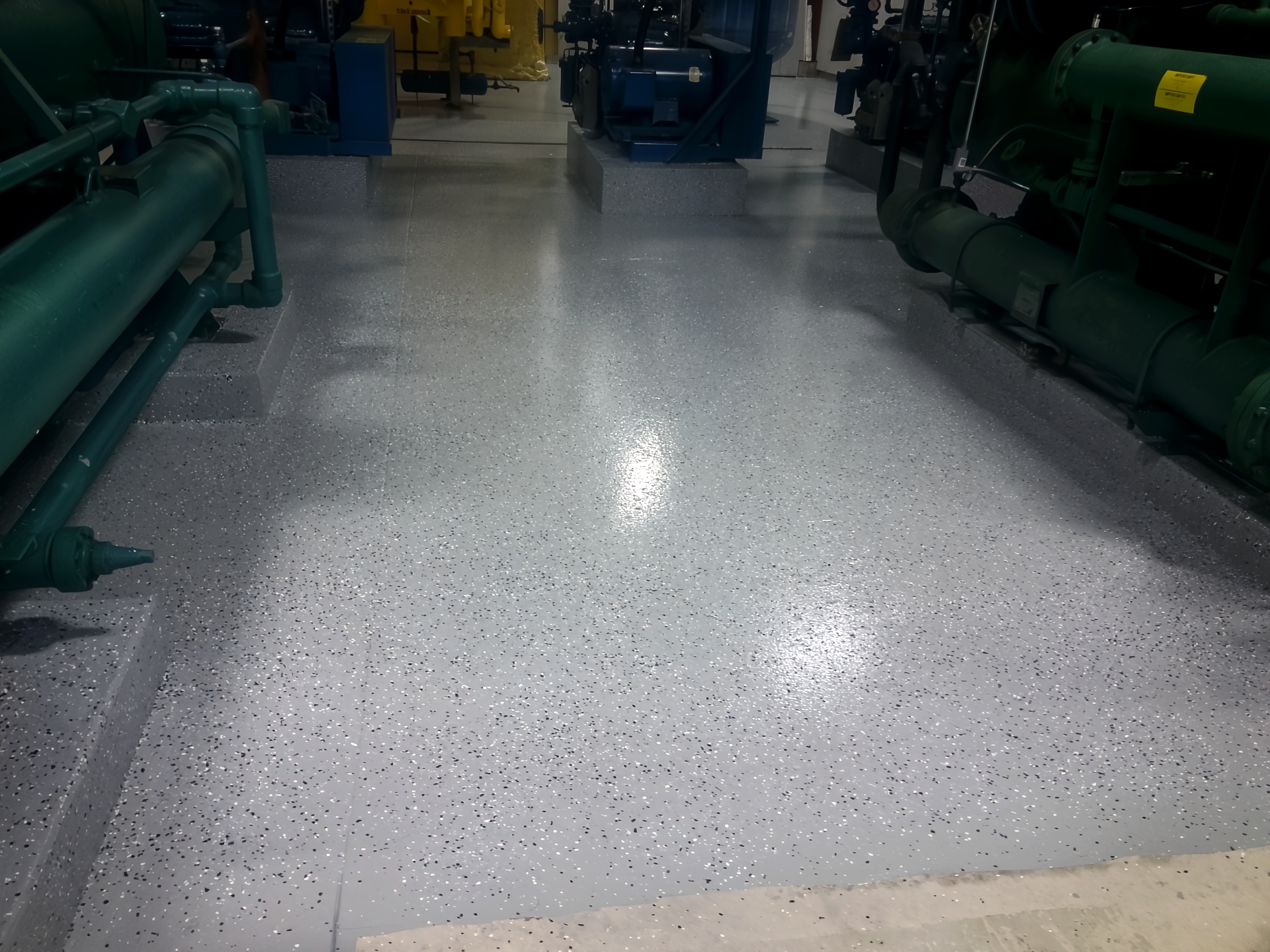 Machine room floor recoated with an ArmorGarage industrial epoxy