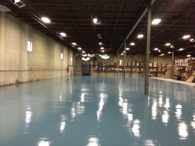 Industrial slab refinished for chemical and traffic resistance
