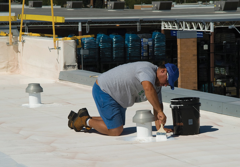 Applying ArmorGarage Roof Repair Mastic to a roof seam or flashing